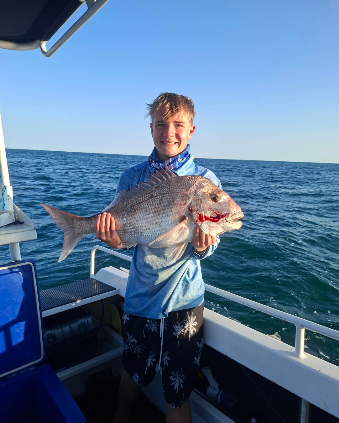 Kieran with a Sunrise Snapper from a hot bite
