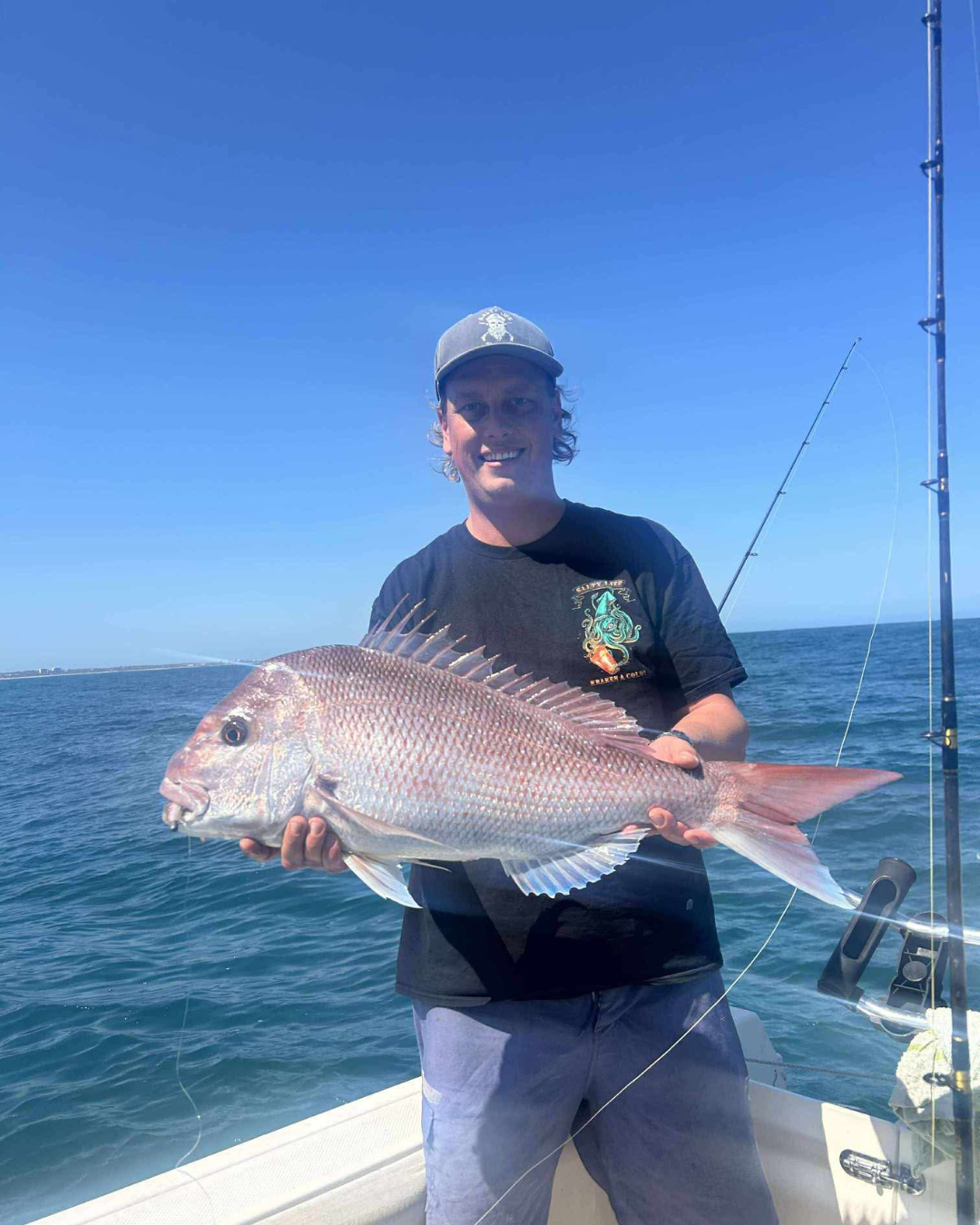 Peter with fish of the day his very own solid Snapper