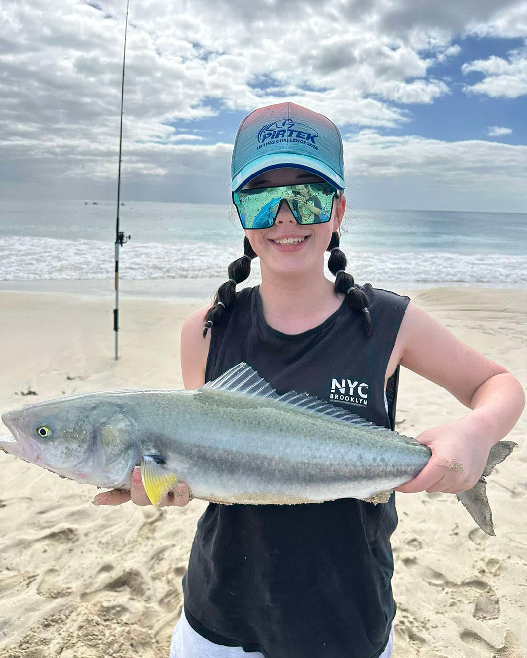 Young angler with salmon caught from Mandurah beach