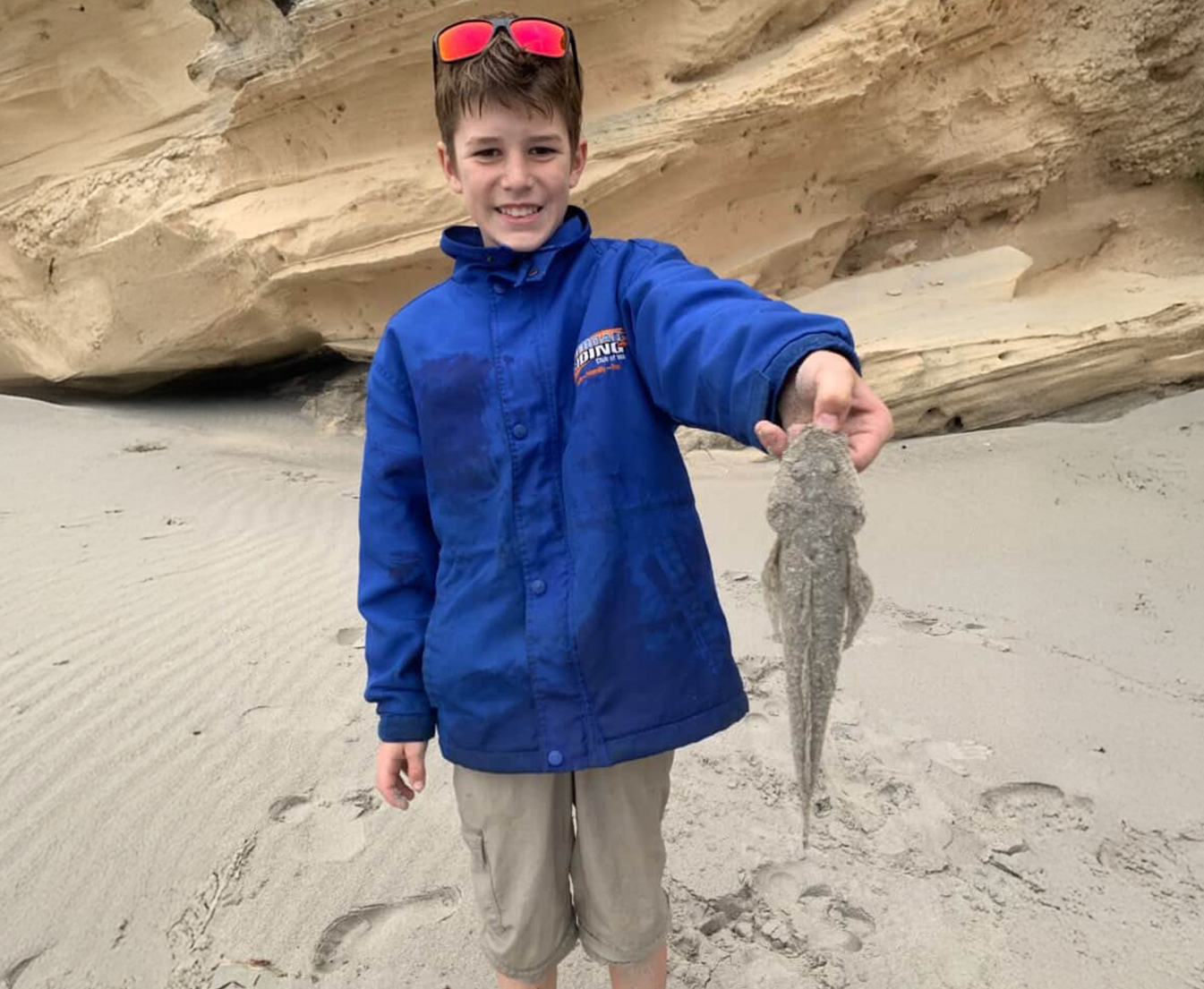 Family enjoying beach fishing activities on Southwest WA coastline
