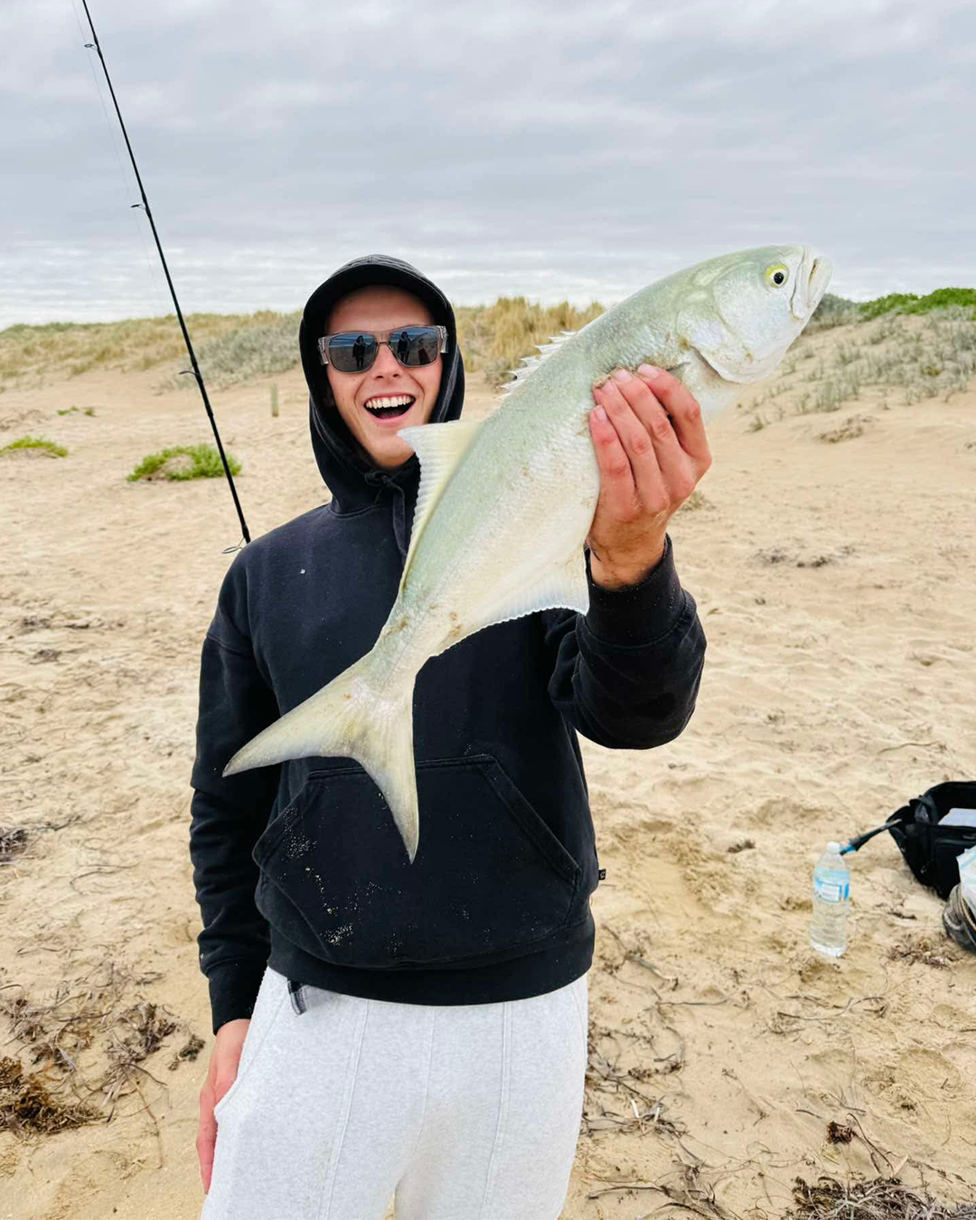 Happy angler displaying chunky tailor caught locally in Mandurah