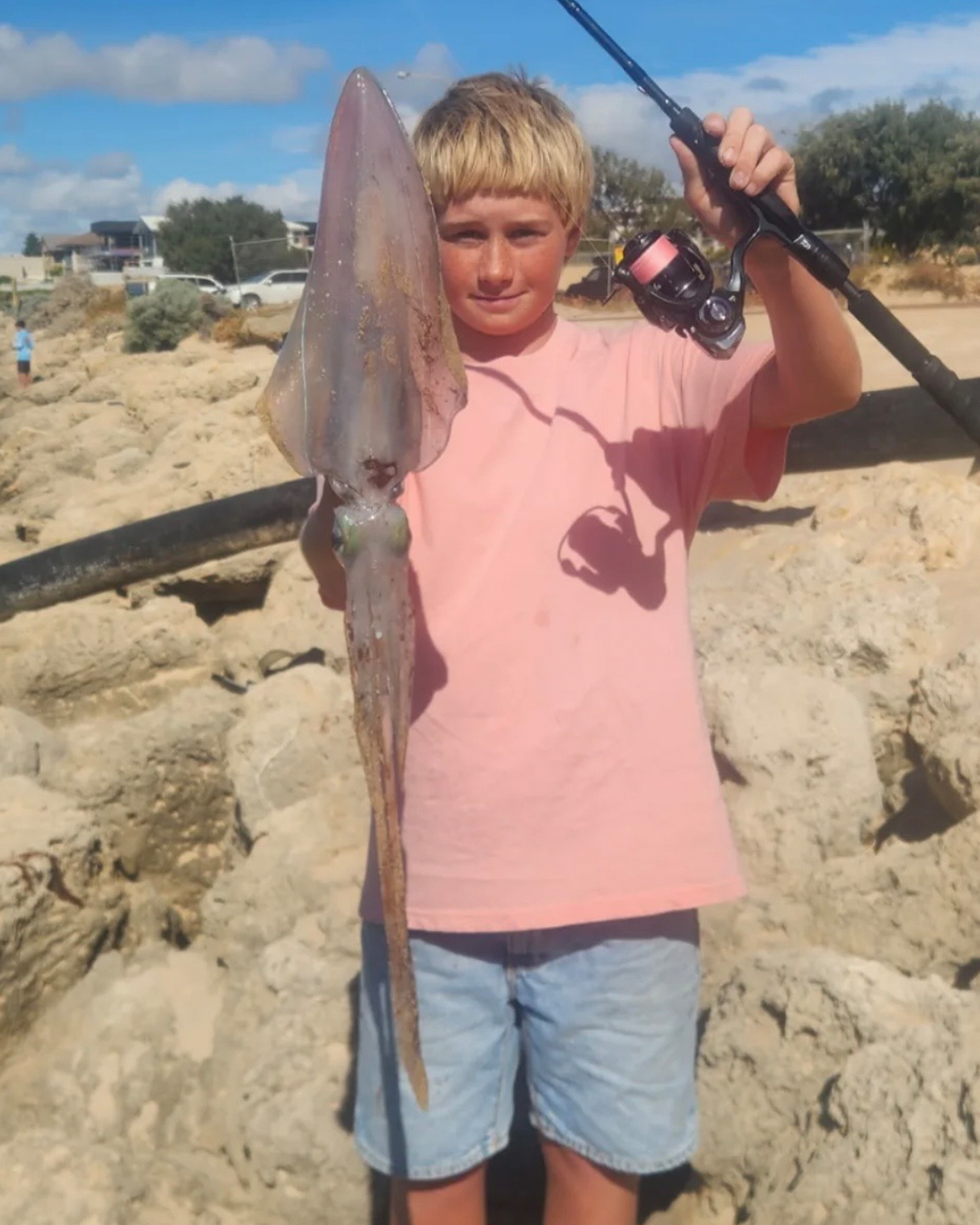 Taj displaying excellent sized squid caught from Mandurah local waters