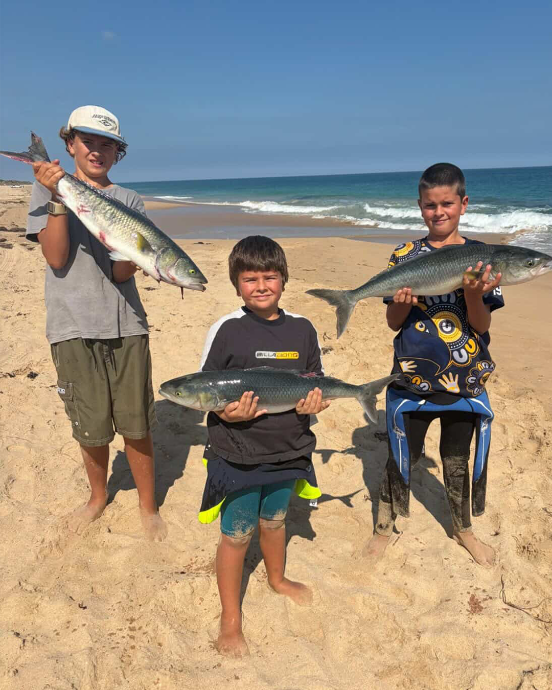 Group of young anglers with their fishing catch display