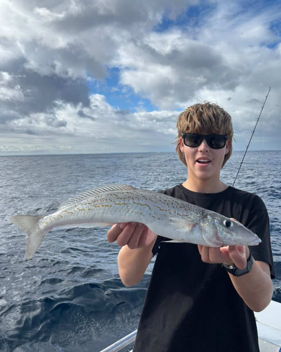 Angler holding King George whiting caught in local Mandurah waters