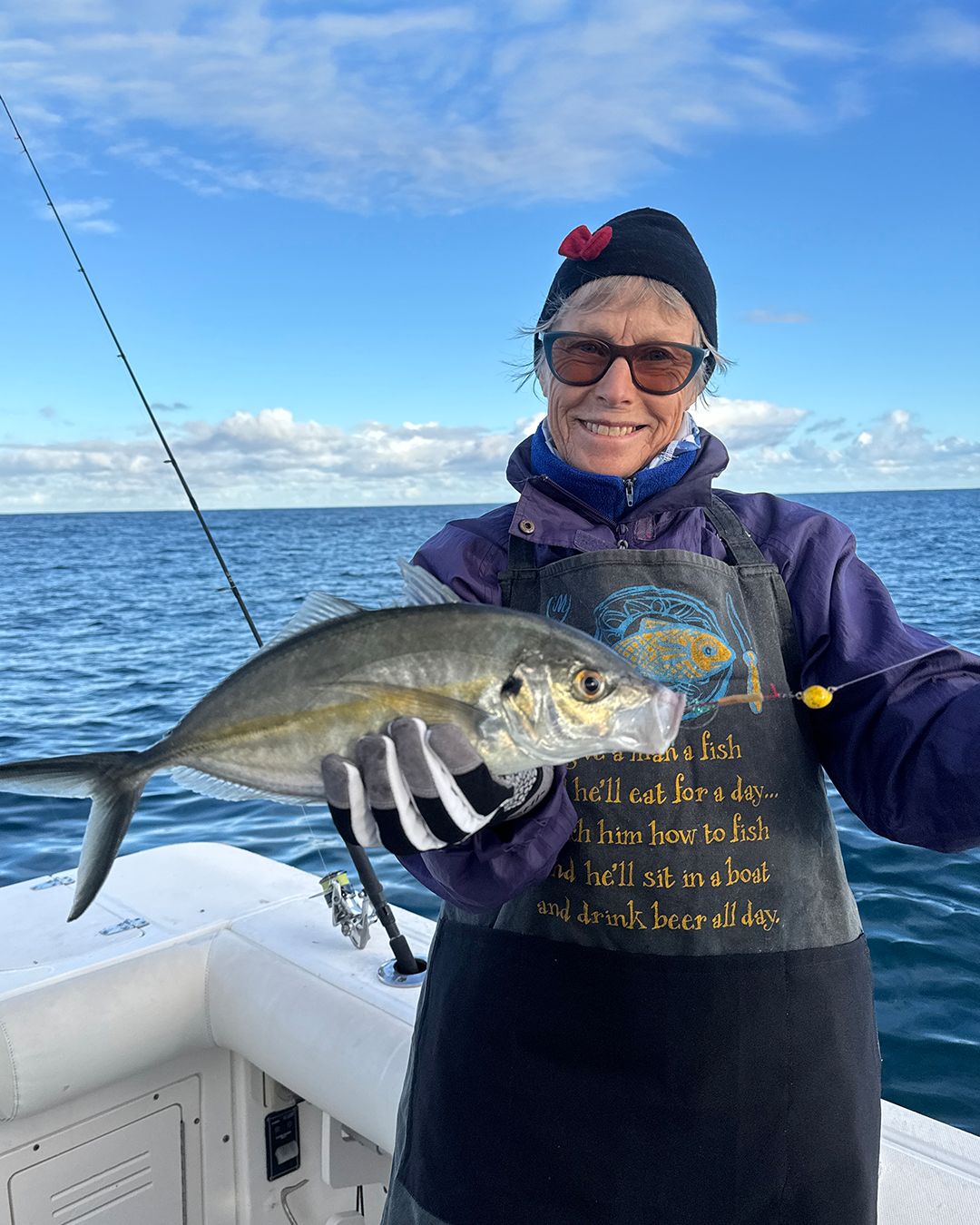 Angler with skipjack tuna caught by anchoring on five fathom reef structure