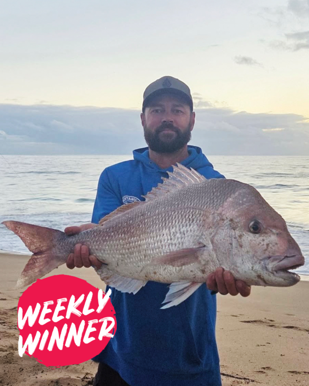 Angler with pink snapper caught from shore using new fishing setup in Mandurah