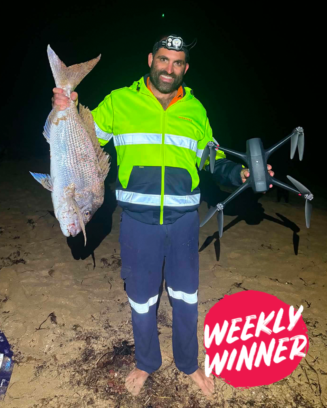 Angler Hayden holding a snapper caught at Mandurah after over a year of trying