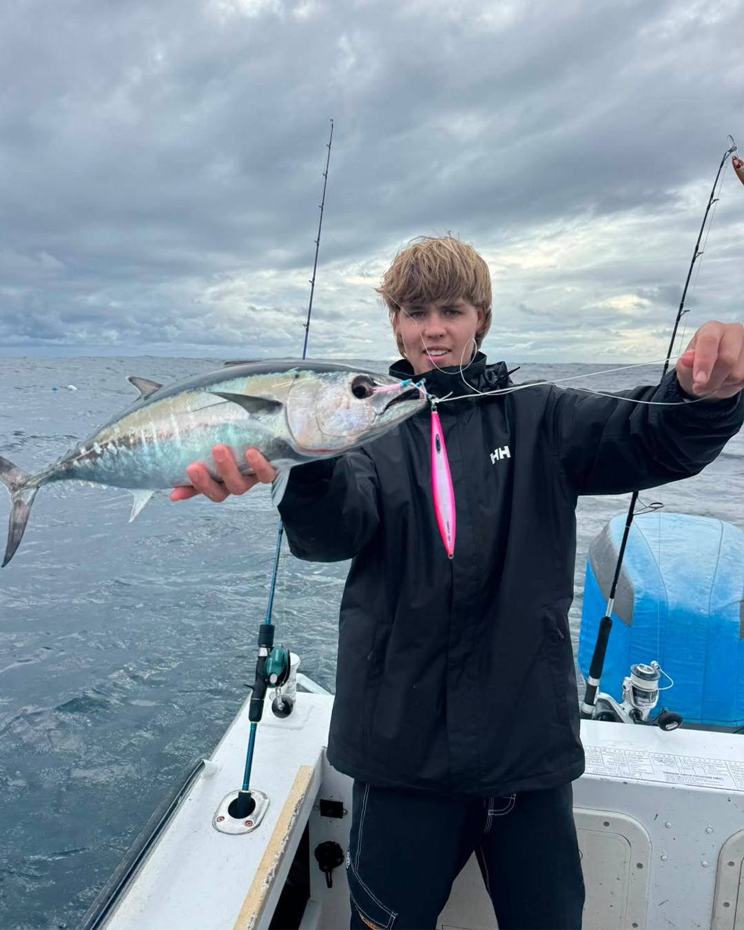 Angler Austin holding a Bluefin Tuna caught on a jig offshore in Mandurah during winter
