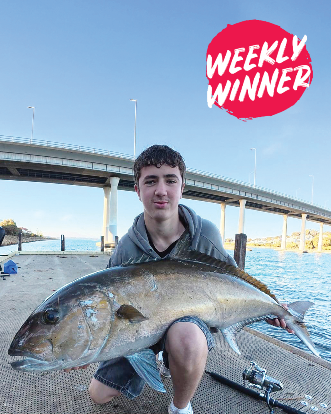 Angler Alex holding a large Samson fish caught land based at Mandurah