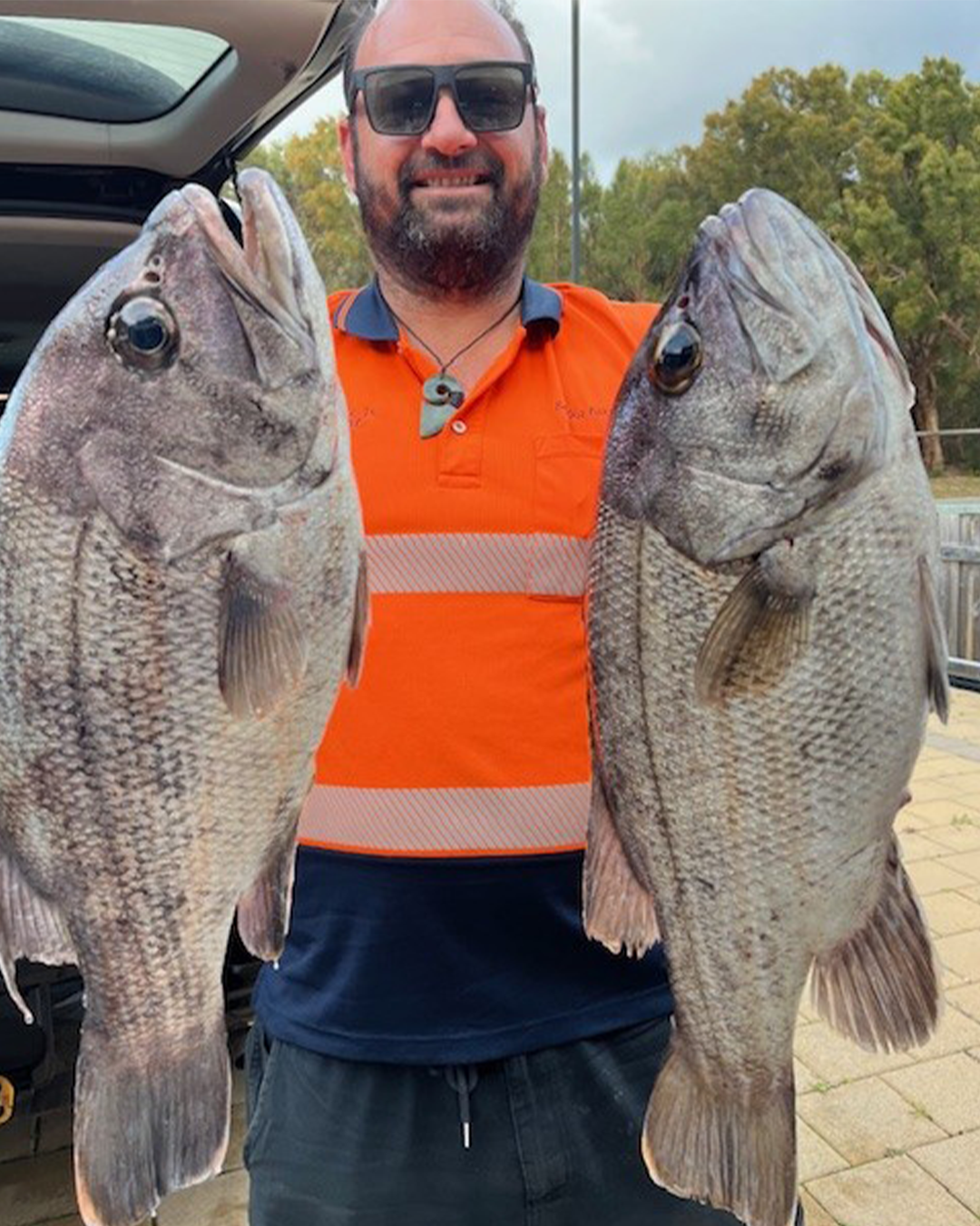 Angler holding an epic dhufish caught off the Mandurah coast in winter