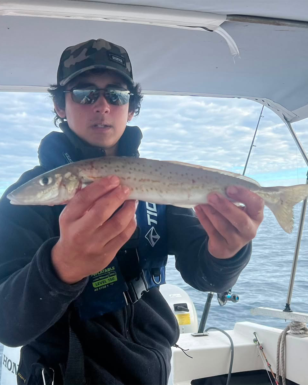 King George Whiting at the gunnel of a boat caught fishing off Mandurah in winter