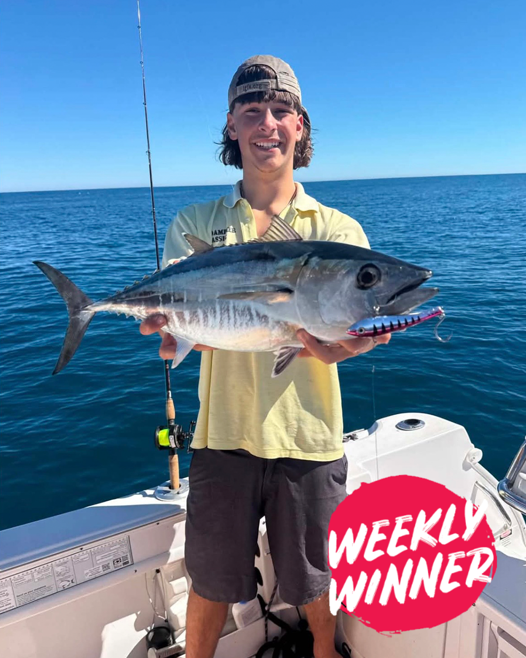 Angler Lochy holding a chunky winter Bluefin Tuna caught off Mandurah