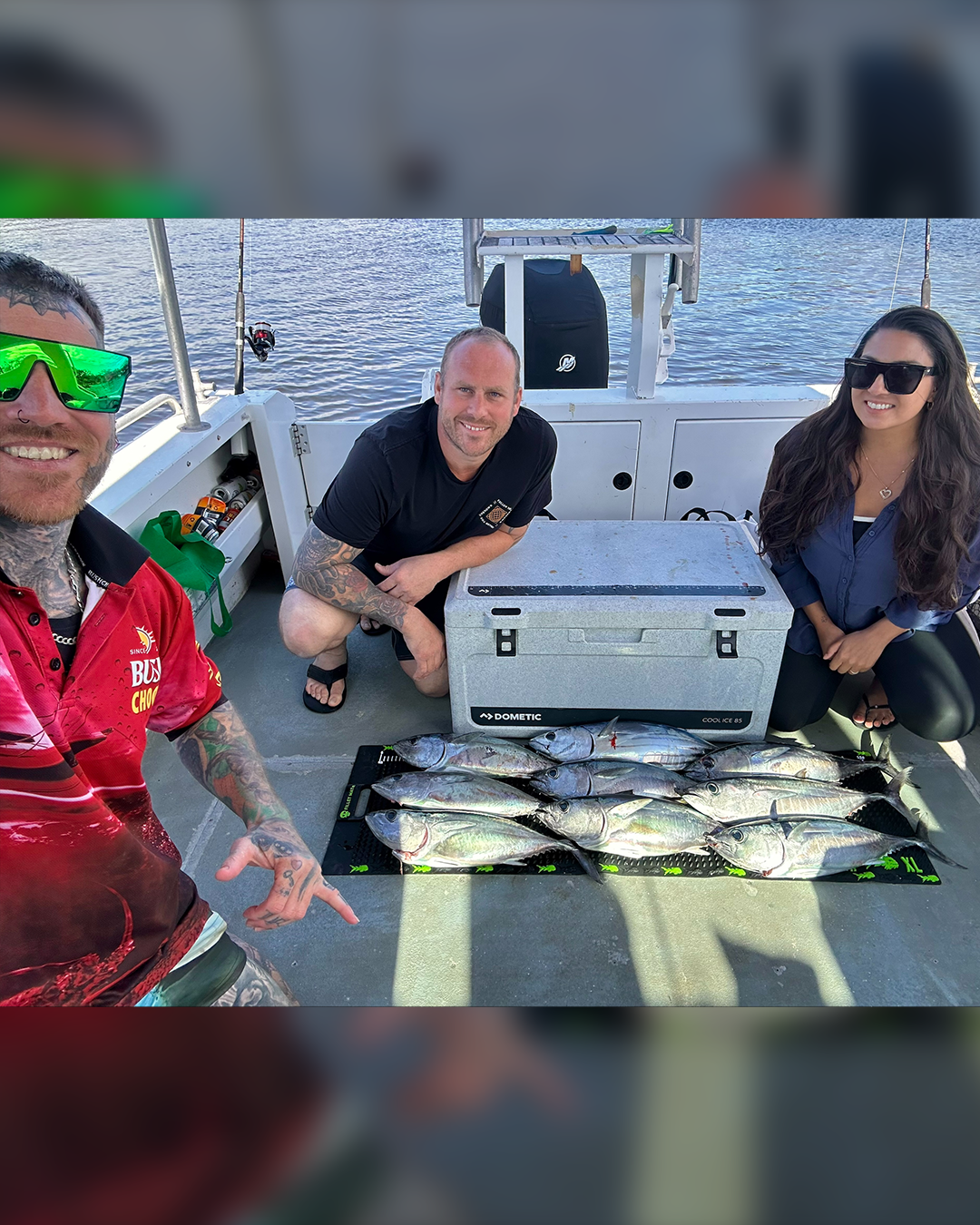 Local anglers on a boat with Bluefin Tuna caught during the winter tuna run off Mandurah